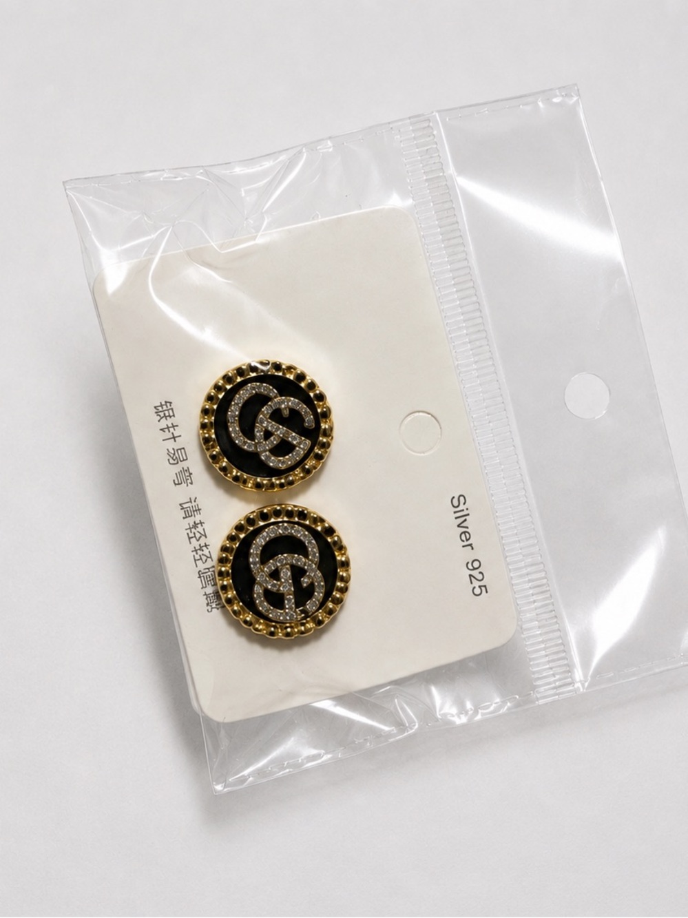 Gold and Black Crystal Accent Round Earrings